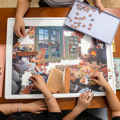 family working together on white puzzle board with rotating tray and drawers