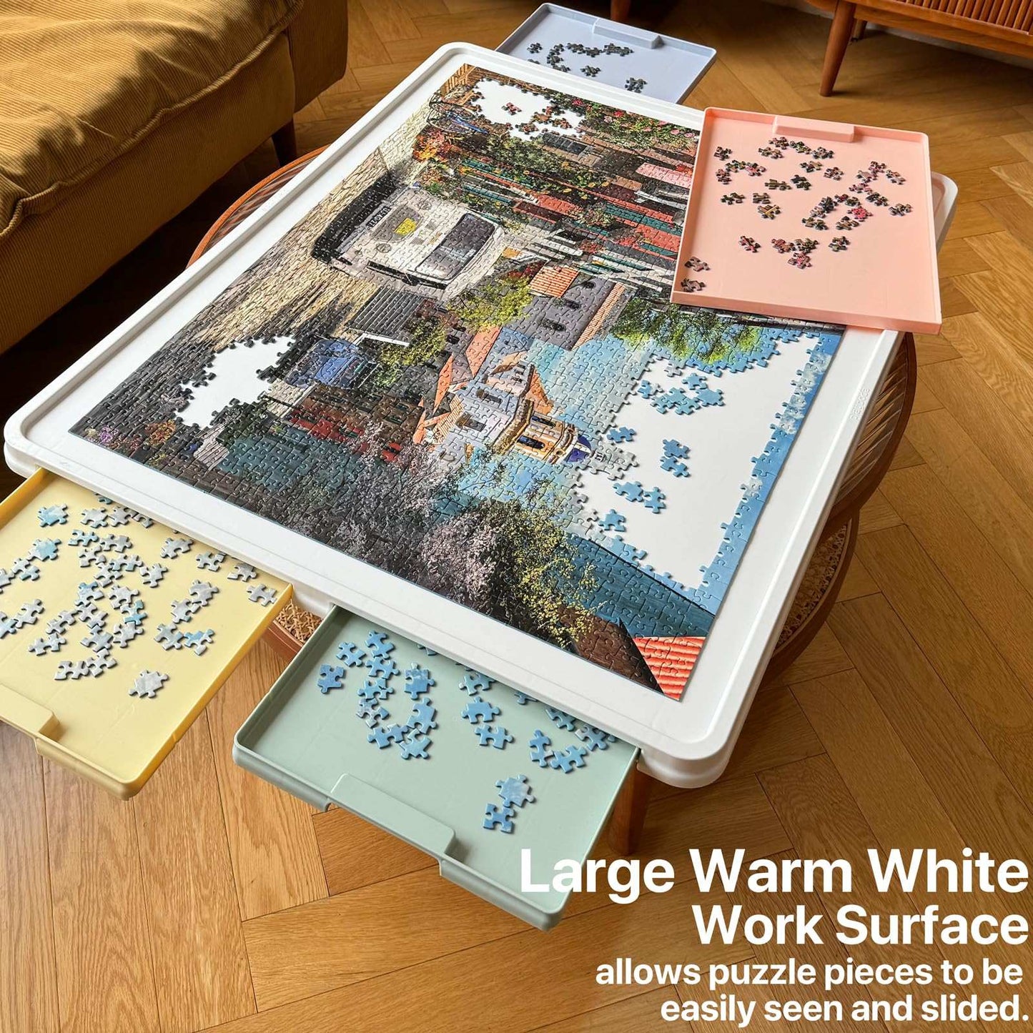 large 1500 piece puzzle board in use with colorful drawers and white rotating surface
